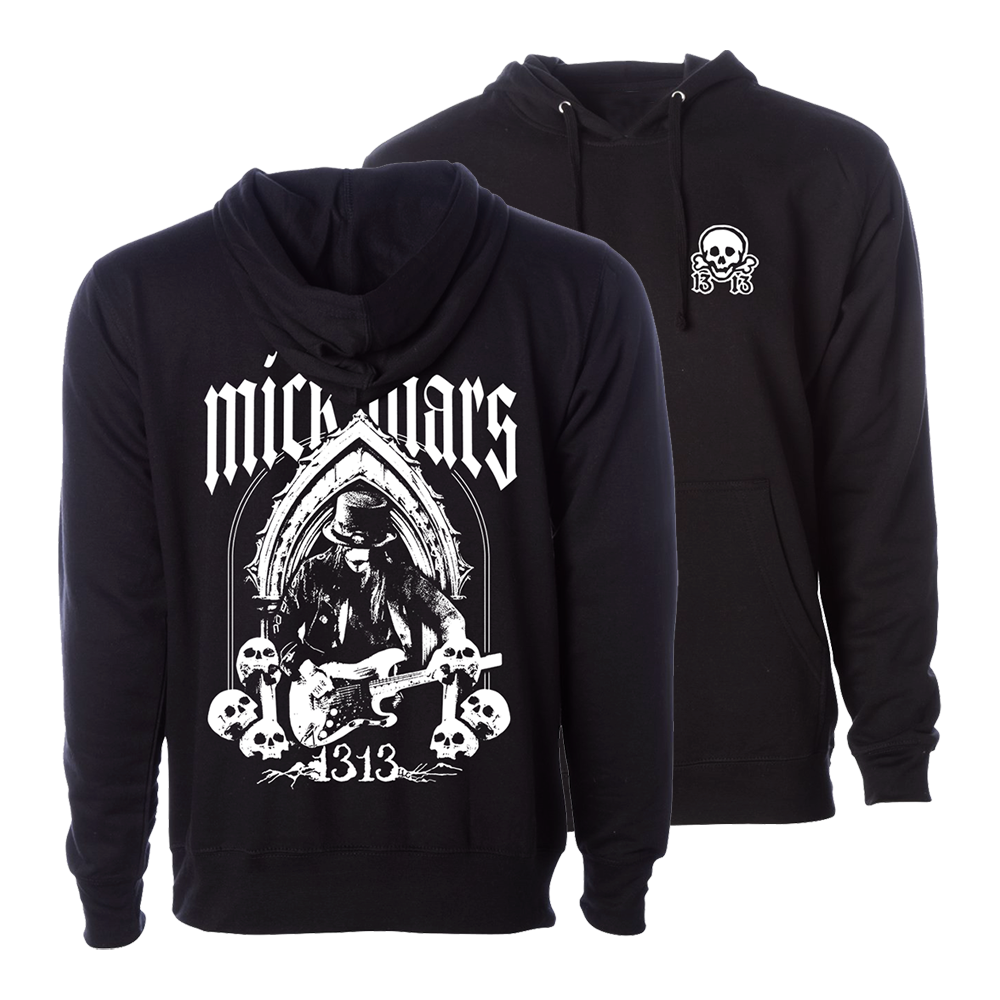 Black hoodie with a gothic rock-style design featuring a guitarist, skulls, and the text ’Mick Mars 313’ on the back.